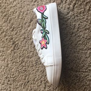 white patched shoes